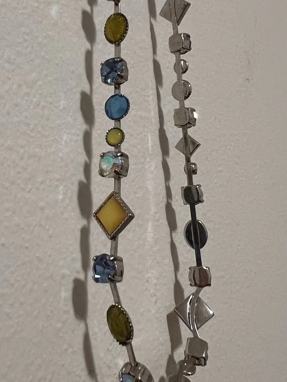Lia Sophia Cache Silver Necklace and matching brac with Blue and Yellow Accents